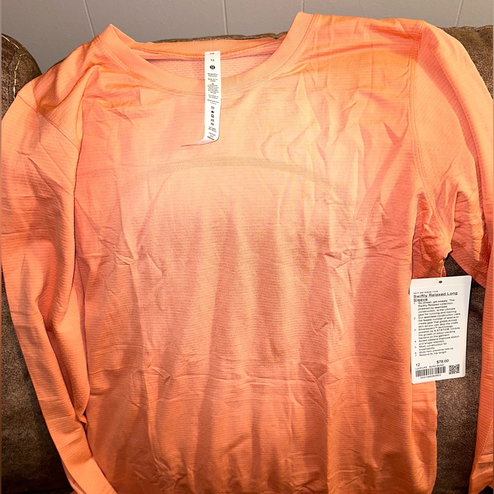 NWT Lululemon Relaxed fit Swiftly Tech Long sleeve, Sunny Coral size 12